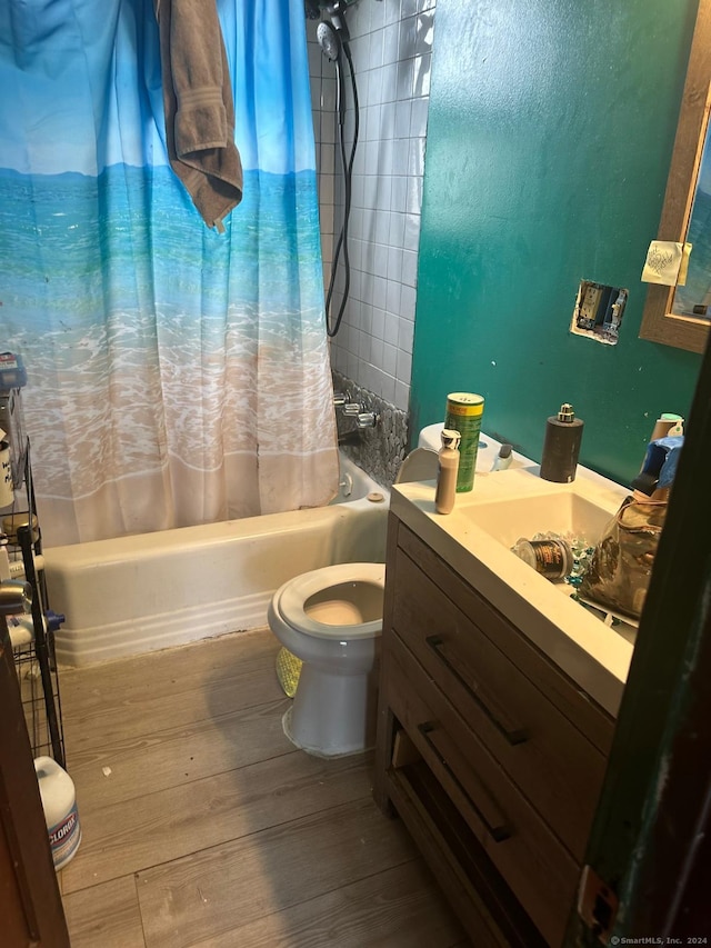 bathroom featuring shower / bath combination with curtain, toilet, and wood-type flooring