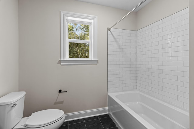 bathroom featuring  shower combination, baseboards, toilet, and tile patterned floors