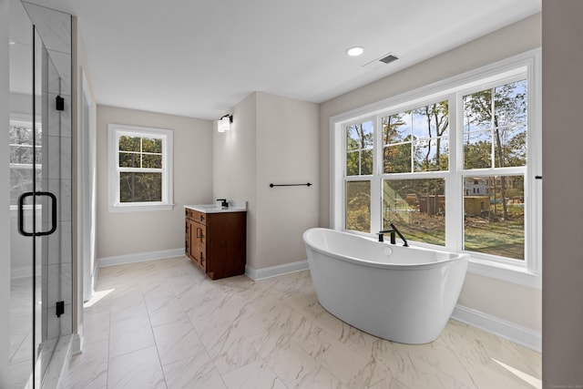 full bathroom featuring marble finish floor, vanity, baseboards, and a shower stall