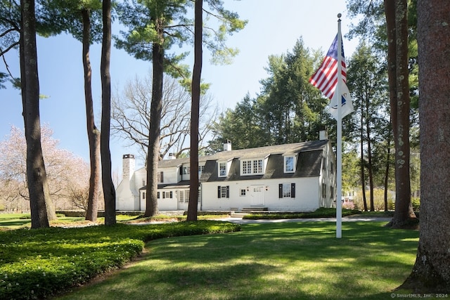 view of front of house with a front yard