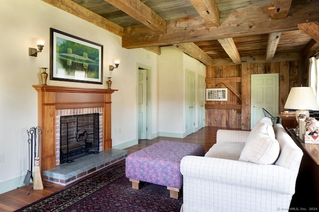 living room featuring wood ceiling, beam ceiling, hardwood / wood-style floors, and a fireplace