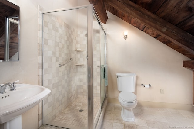 bathroom featuring tile flooring, sink, lofted ceiling, toilet, and a shower with shower door