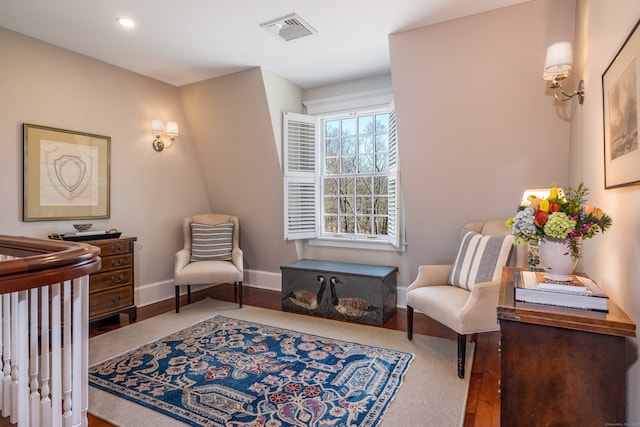 living area featuring carpet flooring