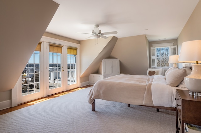 bedroom featuring access to exterior, french doors, ceiling fan, and hardwood / wood-style floors