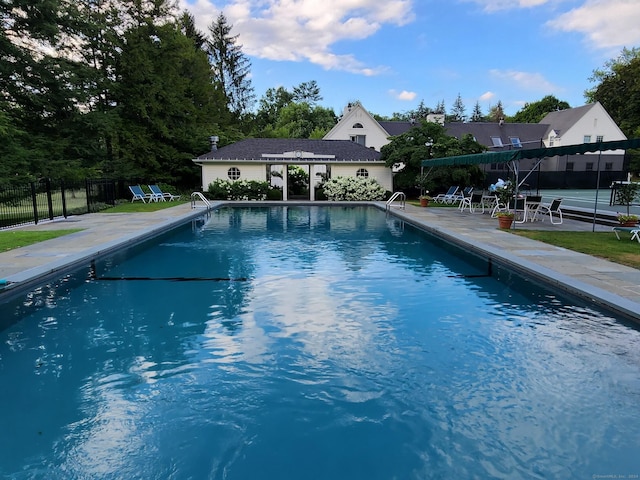 view of pool featuring a patio area