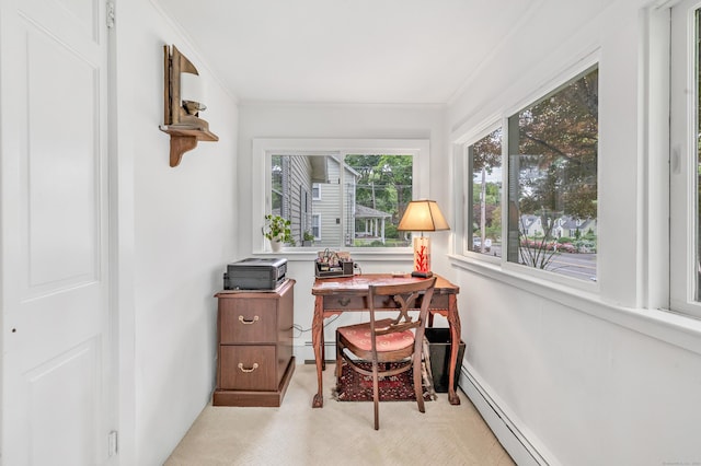 office space featuring ornamental molding and a baseboard heating unit