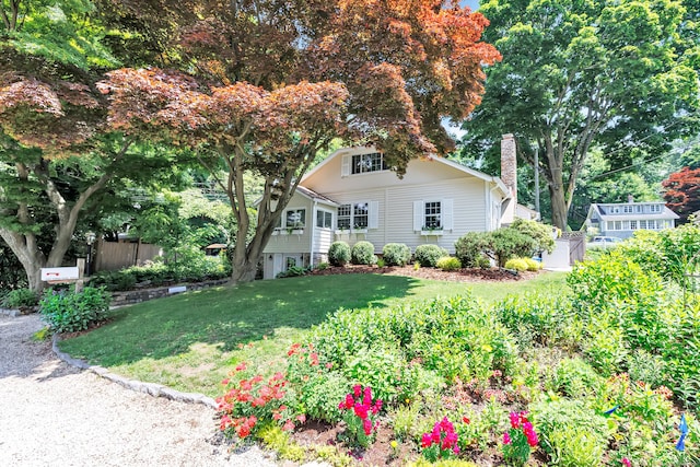 view of front of home with a front yard