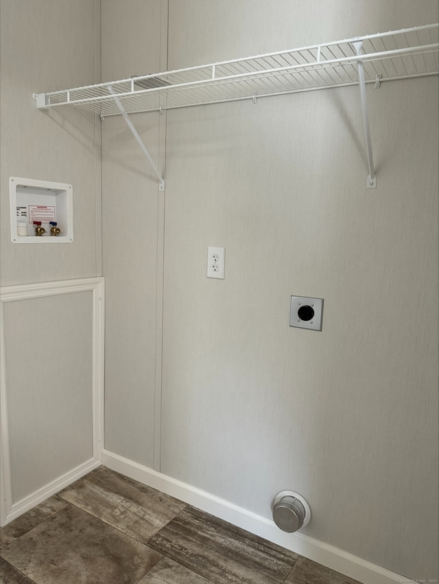 laundry room featuring hookup for an electric dryer, dark hardwood / wood-style flooring, and washer hookup