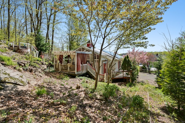 view of yard featuring a deck