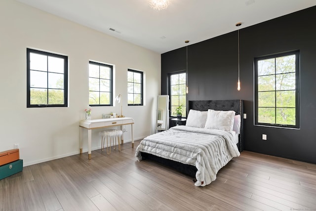 bedroom featuring light wood-type flooring