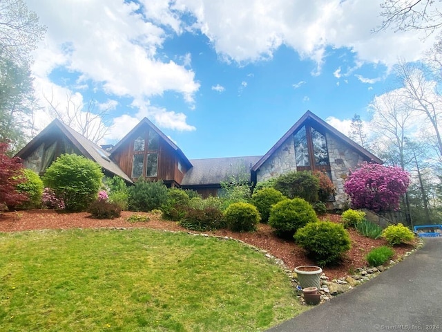 exterior space with a front yard