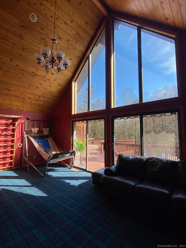 carpeted living room with wood ceiling, high vaulted ceiling, and a notable chandelier