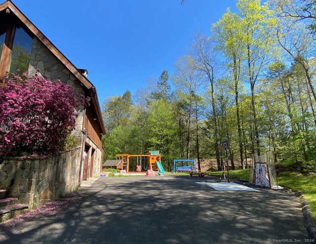 exterior space featuring a playground