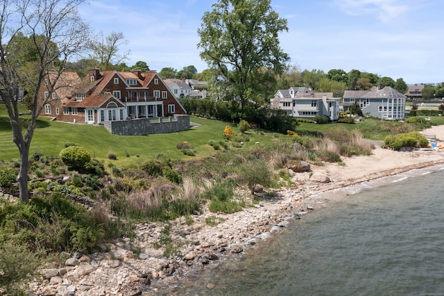 drone / aerial view featuring a water view