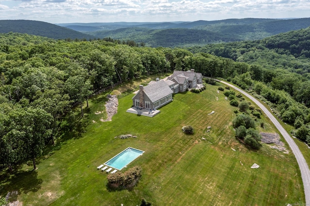 birds eye view of property with a mountain view