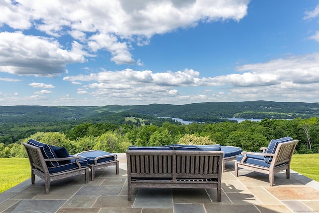 view of patio featuring a mountain view and an outdoor hangout area