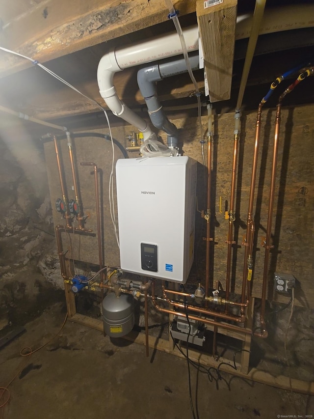 971 New Litchfield St, Torrington, CT 06790 - utility room featuring water heater