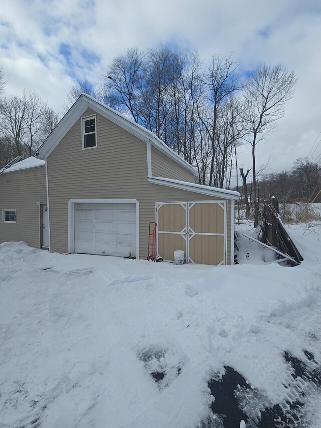 971 New Litchfield St, Torrington, CT 06790 - snow covered property with an outbuilding