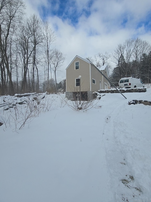 view of snow covered property