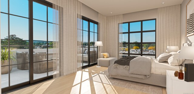 bedroom with light hardwood / wood-style flooring