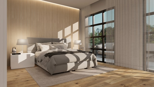 bedroom with light hardwood / wood-style flooring