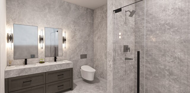 bathroom with a tile shower, vanity, toilet, and tile walls