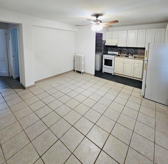 357 Granfield Ave Unit B, Bridgeport, CT 06610 - kitchen with white appliances, radiator heating unit, a sink, tasteful backsplash, and white cabinets