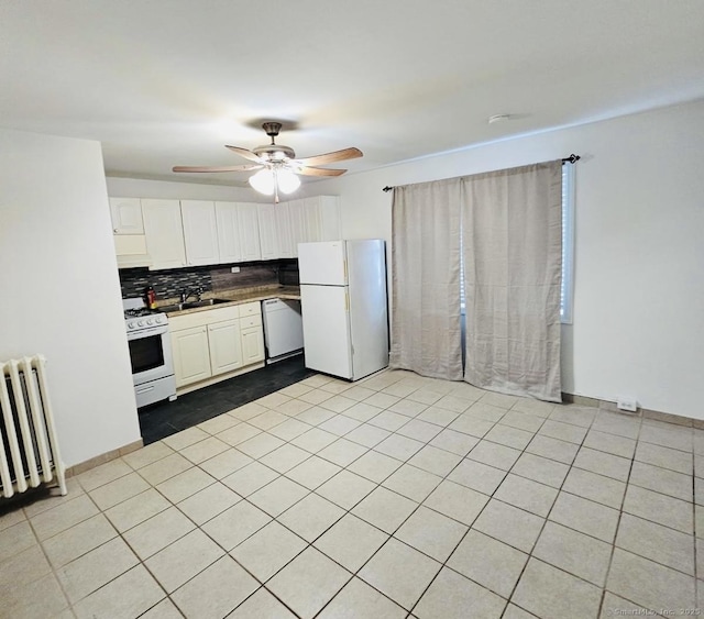 357 Granfield Ave Unit B, Bridgeport, CT 06610 - kitchen featuring white appliances, backsplash, radiator, a sink, and ceiling fan