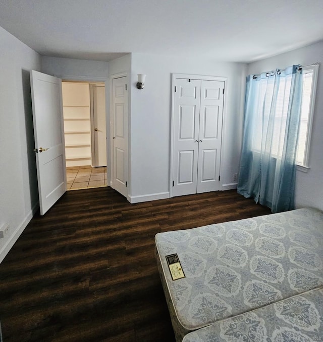 357 Granfield Ave Unit B, Bridgeport, CT 06610 - bedroom featuring wood finished floors, baseboards, and a closet