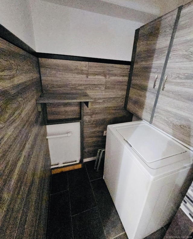 357 Granfield Ave Unit B, Bridgeport, CT 06610 - bathroom featuring wood walls, tile patterned flooring, and a textured ceiling