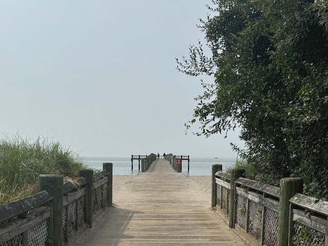 dock area featuring a water view