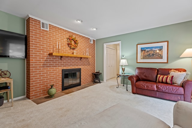 carpeted living room featuring a fireplace