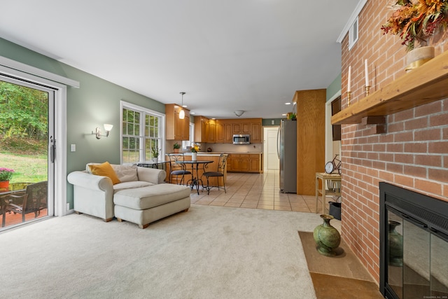 carpeted living room featuring a fireplace