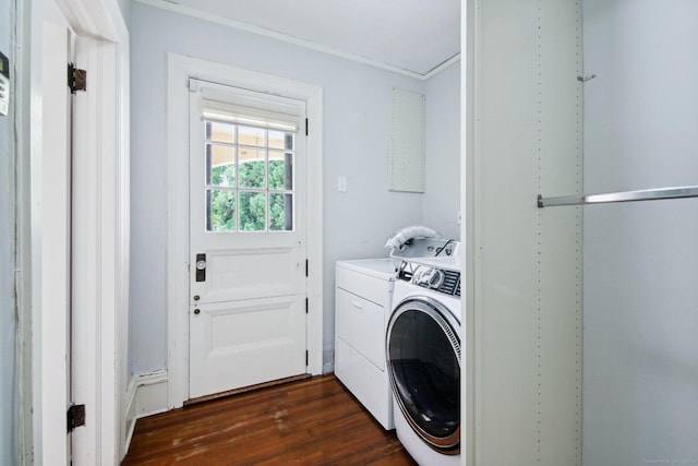 washroom with washing machine and dryer and dark hardwood / wood-style flooring