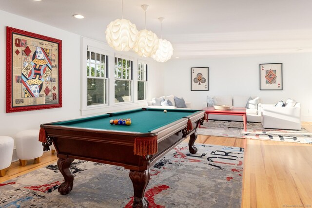 recreation room featuring hardwood / wood-style flooring and pool table