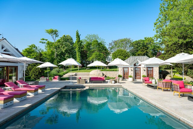 view of pool with a patio