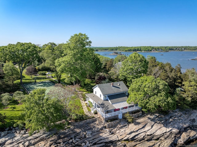 birds eye view of property with a water view