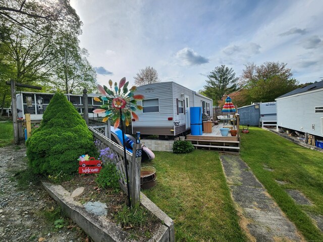 view of yard featuring a deck