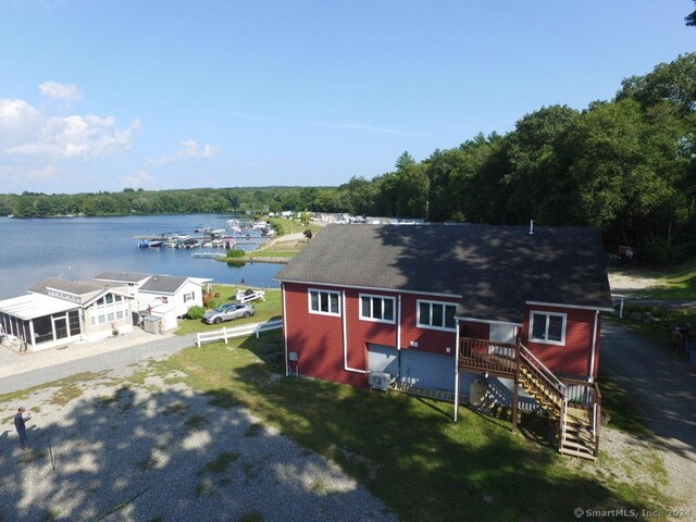 exterior space with a water view