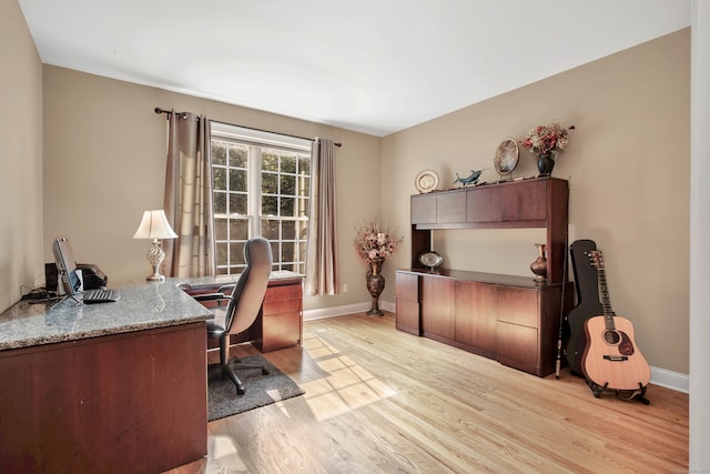 office area with light hardwood / wood-style flooring