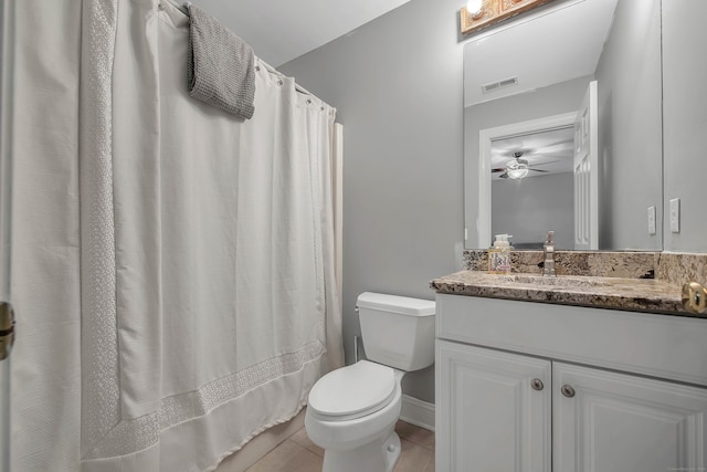 bathroom featuring toilet, tile patterned floors, ceiling fan, vanity, and curtained shower