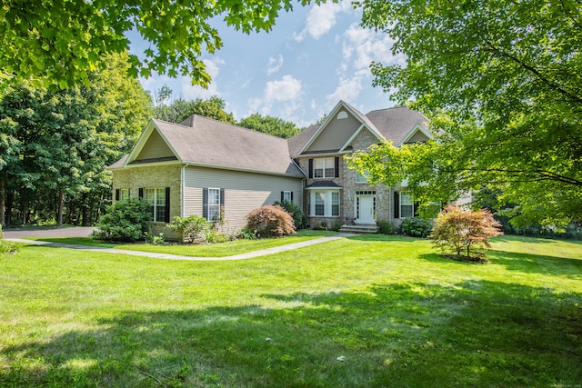 view of front of property with a front lawn