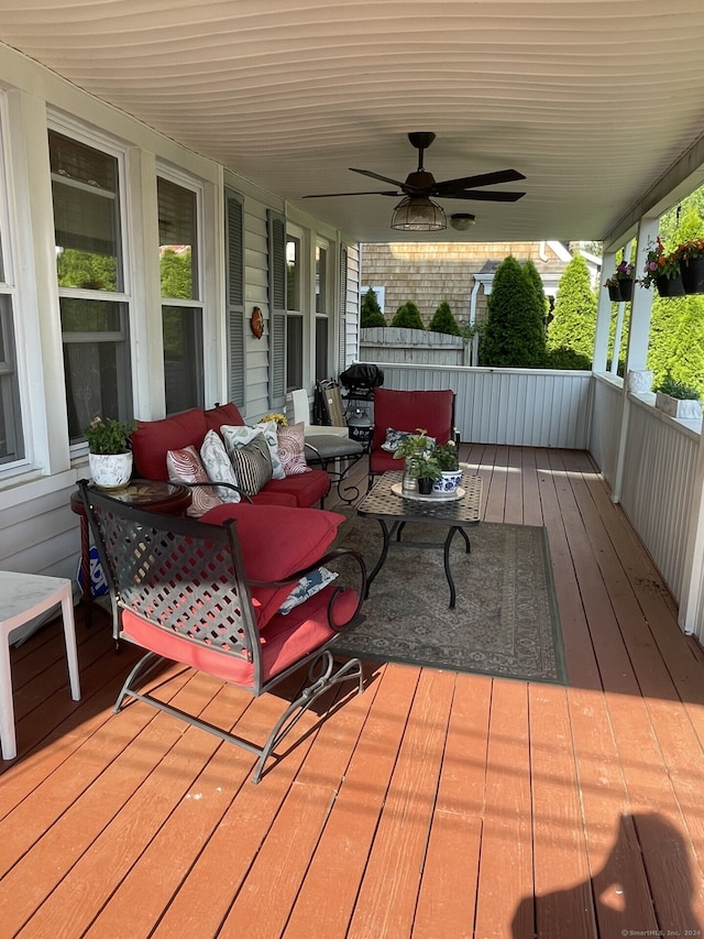 wooden terrace with ceiling fan