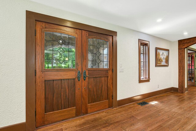 foyer featuring hardwood / wood-style flooring