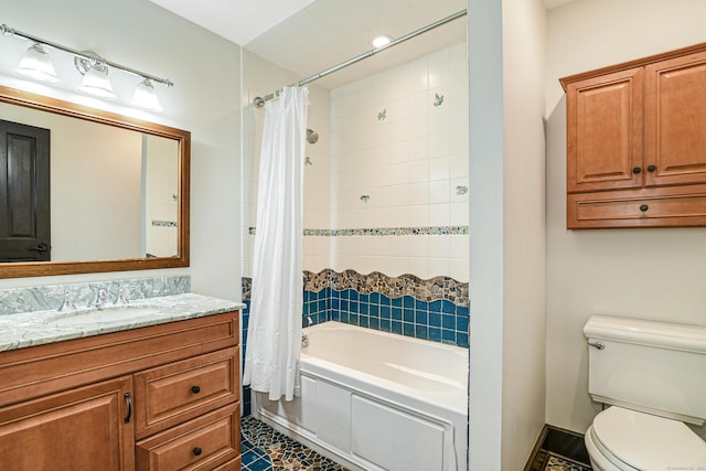 full bathroom with vanity, toilet, tile patterned flooring, and shower / bath combo