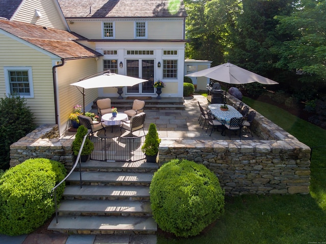 rear view of house featuring a patio area