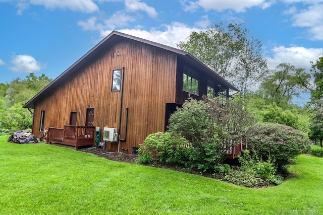 view of property exterior featuring a yard