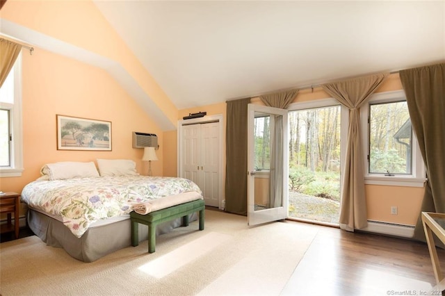 6 Juniper Ledge Ln, Salisbury, CT 06039 - bedroom featuring vaulted ceiling, baseboard heating, access to outside, wood finished floors, and a closet