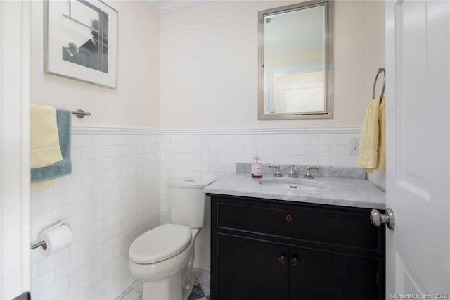 bathroom featuring tile walls, backsplash, vanity with extensive cabinet space, toilet, and tile flooring