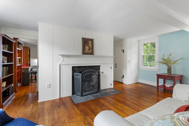 living room with dark wood-type flooring